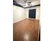 Cozy bedroom featuring hardwood floors, a ceiling fan, and neutral paint at 7017 Baywood Dr, Tampa, FL 33637
