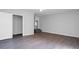 Bedroom featuring laminate flooring and doorway into another space, ready for customization at 7211 & 0 Sunnyside Dr, Brooksville, FL 34601