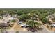 Aerial view of a home with a well-maintained yard in a tree-lined community at 7494 7Th N St, St Petersburg, FL 33702