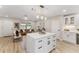 Bright and airy modern island kitchen that connects with the living room, great for entertaining guests at 7494 7Th N St, St Petersburg, FL 33702