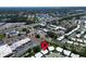 Aerial view showing a community located near commercial zones, roads, and waterways offering a vibrant convenient location at 9136 42Nd N Ln, Pinellas Park, FL 33782