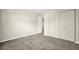 Bright bedroom features neutral carpet and paint, closet, and natural light at 9136 42Nd N Ln, Pinellas Park, FL 33782