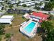 A high angle view of the community pool and clubhouse in a meticulously maintained neighborhood at 9136 42Nd N Ln, Pinellas Park, FL 33782