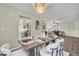 Dining room featuring modern decor, hardwood floors, and an open layout at 9136 42Nd N Ln, Pinellas Park, FL 33782