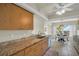Well-lit kitchen with granite countertops and cozy breakfast area at 9136 42Nd N Ln, Pinellas Park, FL 33782