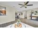 Bright living room boasting wood floors, modern decor, and an open floor plan at 9136 42Nd N Ln, Pinellas Park, FL 33782