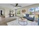 Cozy living room filled with natural light, modern decor, and wood flooring at 9136 42Nd N Ln, Pinellas Park, FL 33782