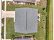 Aerial view of house showcasing the roof, landscaping, patio, and driveway at 9335 Stonewall, New Port Richey, FL 34655