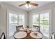 Bright breakfast nook with large windows offering a serene outdoor view at 9335 Stonewall, New Port Richey, FL 34655