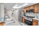 Modern kitchen with lots of storage, stainless steel appliances and white countertops at 9335 Stonewall, New Port Richey, FL 34655