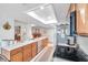 Open kitchen featuring spacious counters, stainless steel appliances and a convenient layout at 9335 Stonewall, New Port Richey, FL 34655