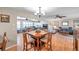 Open-concept space connects kitchen, dining, and living areas for easy entertaining at 9335 Stonewall, New Port Richey, FL 34655