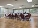 A bright meeting room with ample seating, perfect for gatherings and events at 9335 Stonewall, New Port Richey, FL 34655