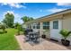 Charming patio with brick pavers, ideal for outdoor seating and entertaining at 9335 Stonewall, New Port Richey, FL 34655