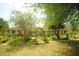 Charming brick home with a well-manicured lawn and beautiful landscaping at 934 Jerry Smith Rd, Dover, FL 33527