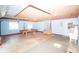 Spacious garage featuring ample room for parking and storage, with added workspace and utility sink at 934 Jerry Smith Rd, Dover, FL 33527