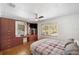 Stylish bedroom with wood floors, built-in storage, and natural light at 936 Alcazar Way S, St Petersburg, FL 33705