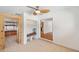 Bright bonus room with a bench, built-in shelving, and tiled floor at 936 Alcazar Way S, St Petersburg, FL 33705