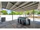 Outdoor patio featuring a shaded area, bar, and seating perfect for entertaining at 936 Alcazar Way S, St Petersburg, FL 33705