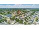 Aerial view of a neighborhood with a pond and a home marked with a red pin at 10505 Boyette Creek Blvd, Riverview, FL 33569