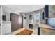 Spare bedroom featuring a murphy bed, shelves, and stylish decor creating a flexible living space at 10505 Boyette Creek Blvd, Riverview, FL 33569