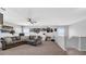 Large bonus room with comfortable seating, neutral carpeting, and well-lit entertainment area at 10505 Boyette Creek Blvd, Riverview, FL 33569