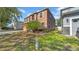 Two-story home featuring a neatly maintained lawn and complemented by lush, mature landscaping at 10505 Boyette Creek Blvd, Riverview, FL 33569