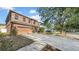 Two story home with an attached two car garage and long driveway at 10505 Boyette Creek Blvd, Riverview, FL 33569
