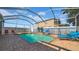Fenced in pool area with brick deck, in-ground pool, and outdoor seating at 10505 Boyette Creek Blvd, Riverview, FL 33569