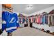 Spacious walk-in closet with shelving and rods offering ample storage space for an organized wardrobe and personal items at 10505 Boyette Creek Blvd, Riverview, FL 33569