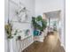 Well decorated foyer with hard wood floors, and a decorative console table at 10901 Sundrift Dr, Tampa, FL 33647