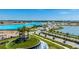 Beautiful community featuring a lagoon, palm trees, and scenic walking areas with amenities at 11079 Linden Depot Rd, San Antonio, FL 33576
