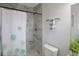 Renovated bathroom featuring a tiled walk-in shower and modern fixtures at 11104 Hackney Dr, Riverview, FL 33578