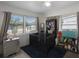 Bedroom with lots of natural light from two windows and a full size crib at 11104 Hackney Dr, Riverview, FL 33578