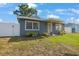 Well-kept single-story home with a fenced yard and tidy landscaping at 11104 Hackney Dr, Riverview, FL 33578