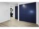 Bedroom features sliding closet doors and an adjacent ensuite bathroom with blue vanity at 11747 104Th N St, Largo, FL 33773