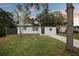 Charming single-story home featuring a freshly painted exterior, updated windows, and a well-manicured front yard at 11747 104Th N St, Largo, FL 33773