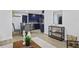 Well-lit space shows living and dining areas with a glimpse into the modern kitchen at 11747 104Th N St, Largo, FL 33773