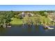 Beautiful lakeside estate with rolling lawn and private dock at 11865 Fort King Hwy, Thonotosassa, FL 33592