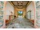 Grand foyer with stone floors, decorative accents, and views of landscaped grounds at 11865 Fort King Hwy, Thonotosassa, FL 33592