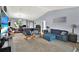 Neutral living room featuring vaulted ceilings and plenty of natural light at 12017 Vermillion Way, Riverview, FL 33569