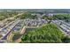 Expansive aerial view showcasing residential planning, featuring houses, waterways and roads for ease of access at 1432 Gopher Loop, Tarpon Springs, FL 34689