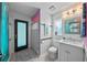 Bright bathroom with modern vanity, tile flooring, and mermaid-themed decor at 14702 Dartmoor Ln, Tampa, FL 33624