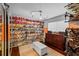 Spacious closet with custom shelving to hold a generous shoe collection at 14702 Dartmoor Ln, Tampa, FL 33624