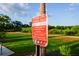 Laurel Oak Fitness Trail park sign with trail guidelines for hikers in Carrollwood Village at 14702 Dartmoor Ln, Tampa, FL 33624