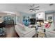 Bright living room with modern decor and an open layout to the pool at 14702 Dartmoor Ln, Tampa, FL 33624