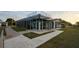 Exterior view of a modern nature center building with large windows and a covered entrance at 14702 Dartmoor Ln, Tampa, FL 33624