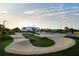 The Skate Park features expertly designed concrete ramps surrounded by vibrant green areas at 14702 Dartmoor Ln, Tampa, FL 33624