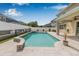 Swimming pool and landscaping in a backyard at 14718 Rocky Brook Dr, Tampa, FL 33625