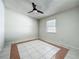 Bright bedroom with tile floors and a ceiling fan at 1623 Carter Oaks Dr, Valrico, FL 33596